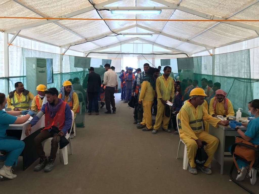 Camp in operation — 200+ workers screened across the day · Abu Dhabi · 2018