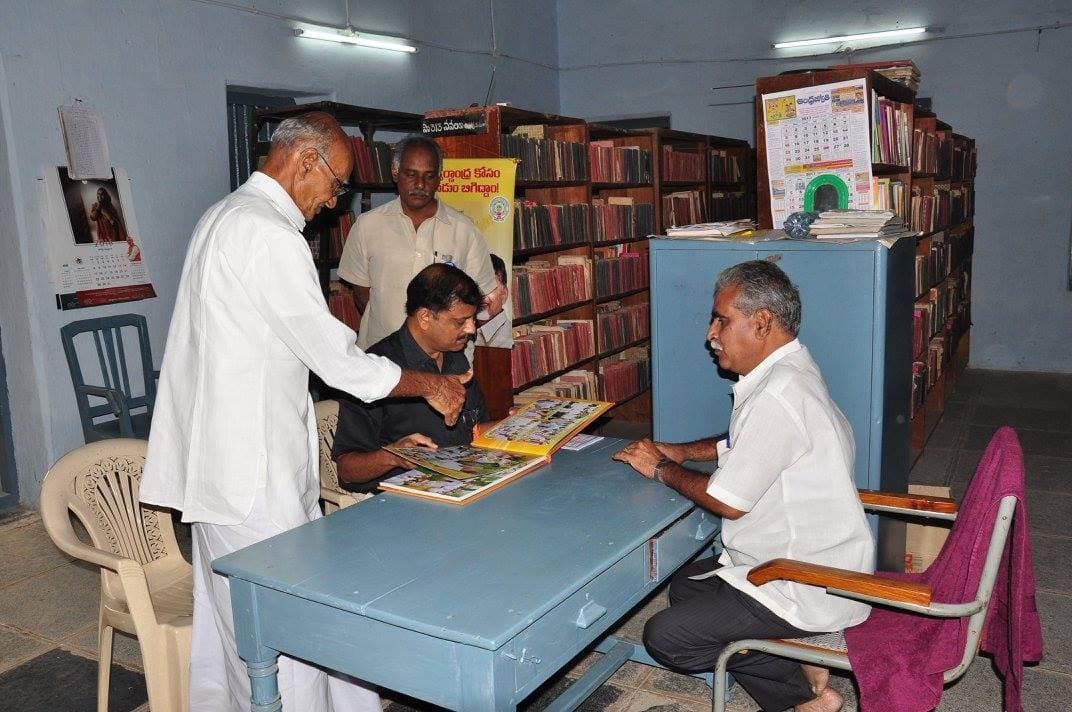 bNg founders review the foundation’s archive · Konakanchi village library