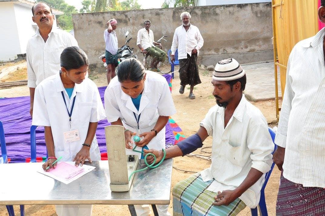 Nursing student measures blood pressure · Sukheebhava 2017